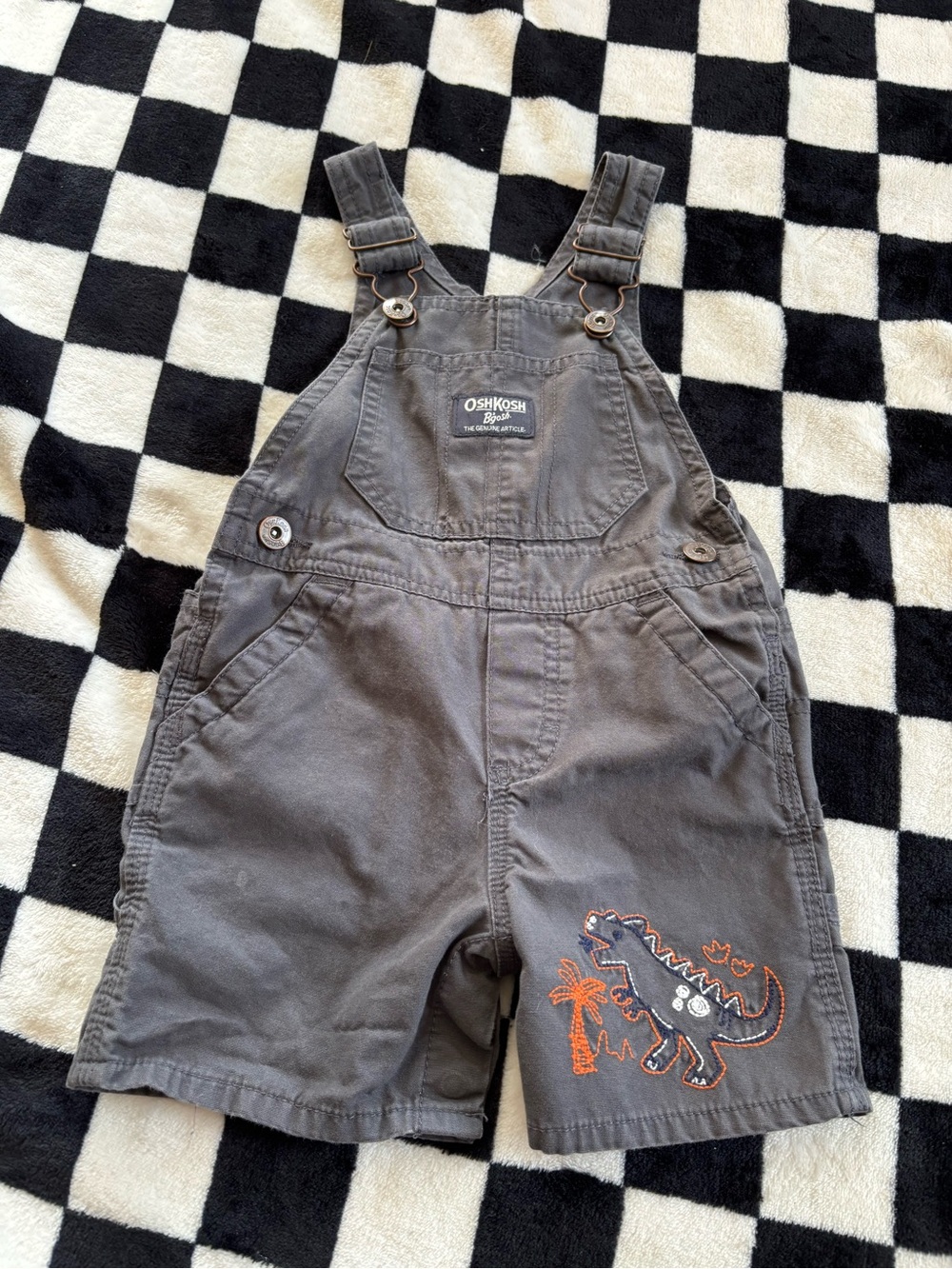 12 month shorties from Oshkosh small stain on leg